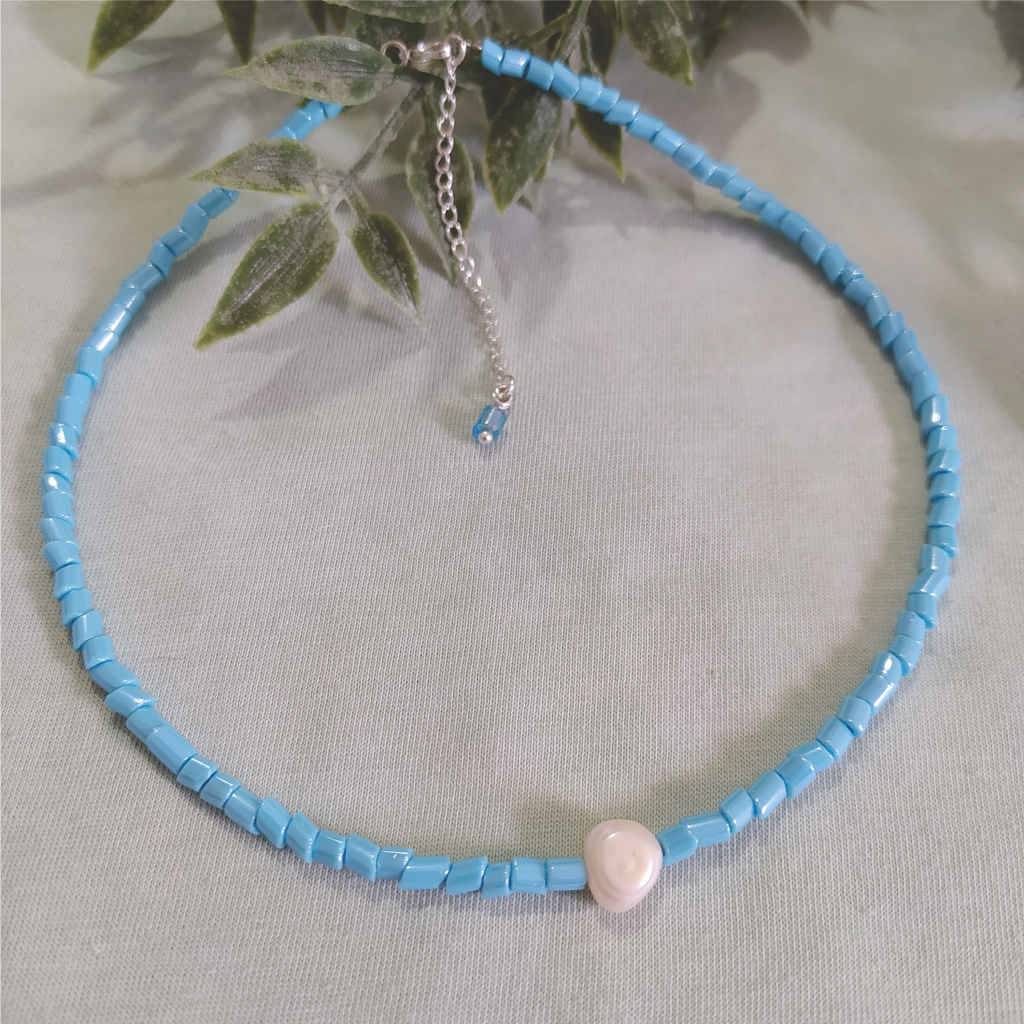 Colar conta cristal de murano azul turquesa e pérola natural banhado em Prata 925