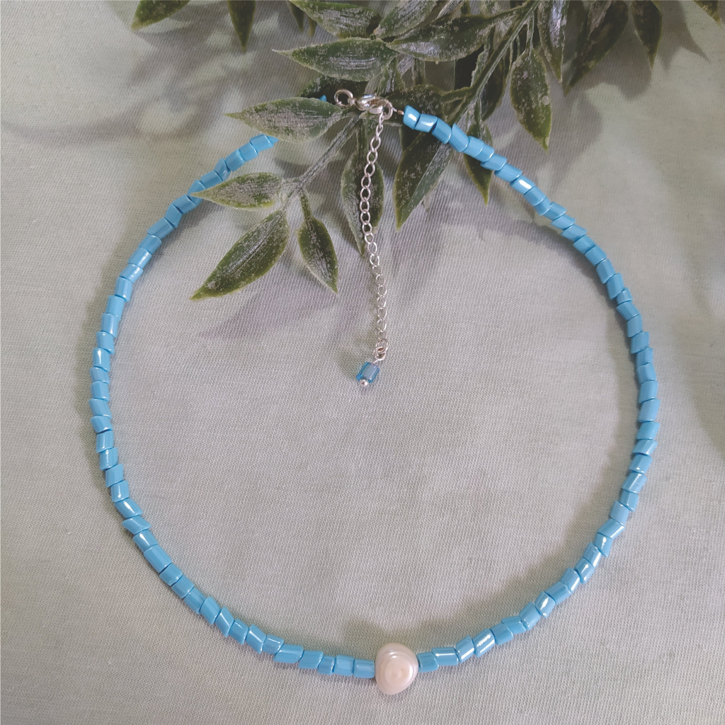 Colar conta cristal de murano azul turquesa e pérola natural banhado em Prata 925